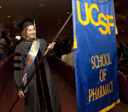 Schweitzer with banner