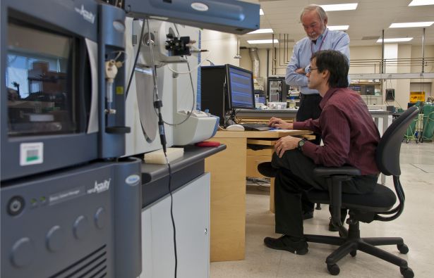 scientists with equipment in Burlingame Lab