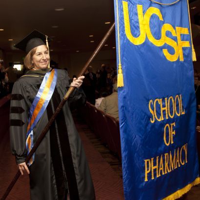 Schweitzer with banner