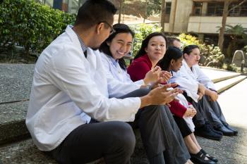 students sitting on steps 